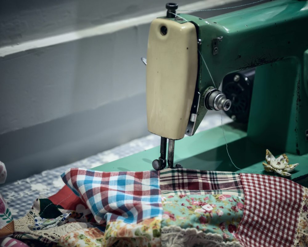 Old vintage hand sewing machine. Selective focus